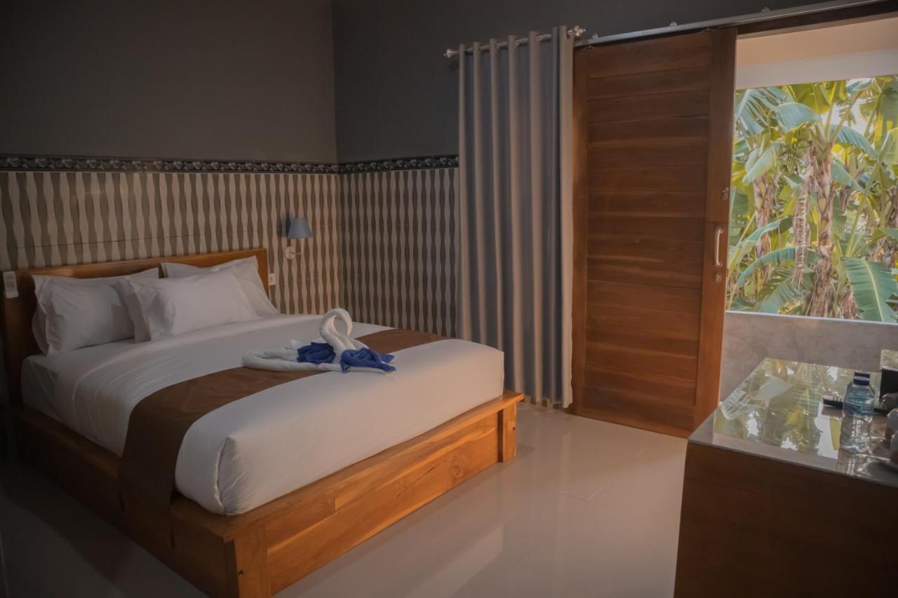 Prasi Sunrise Homestay Toyapakeh Extérieur photo